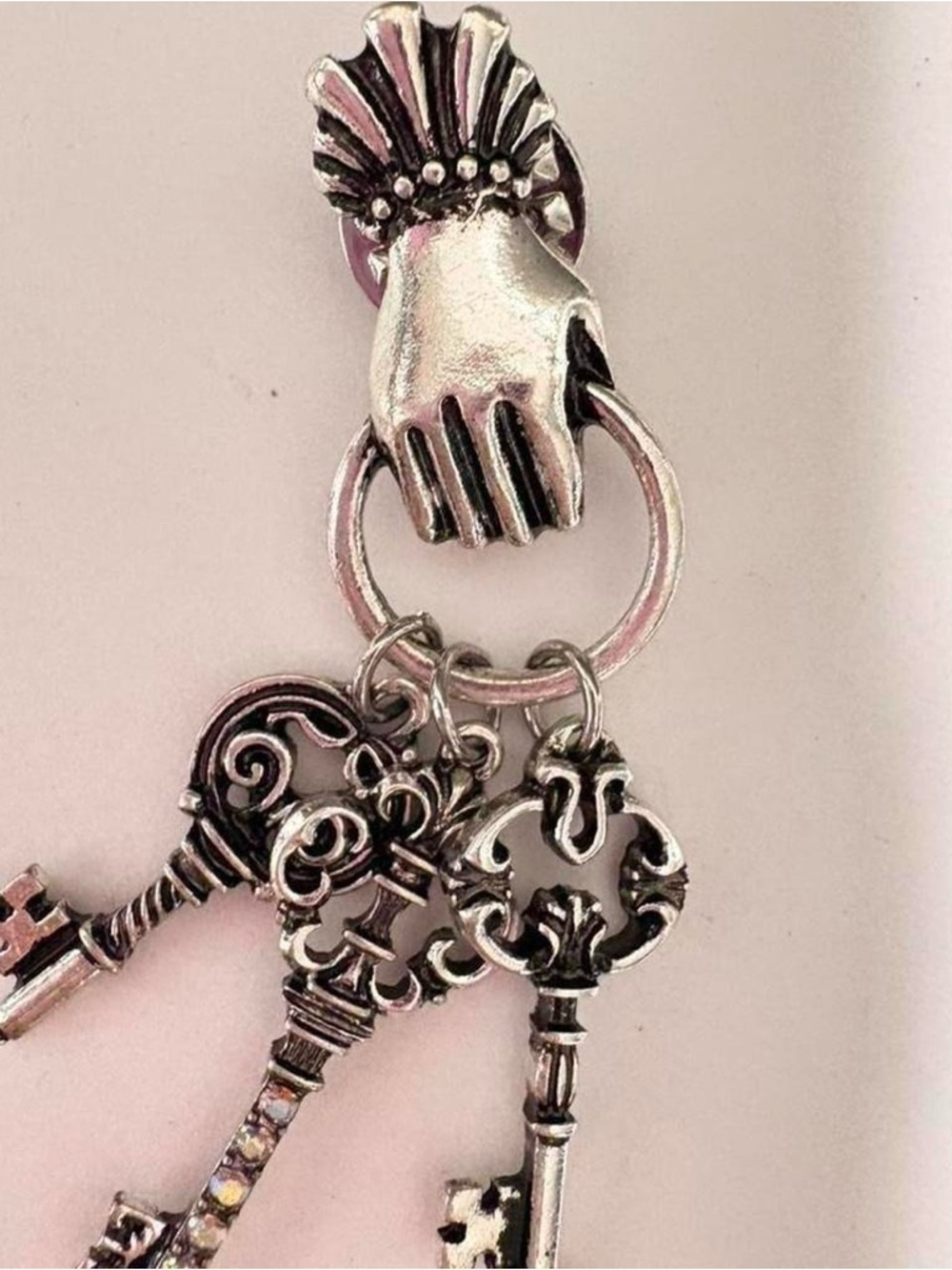 Vintage inspired Silver Tone hand holding Keys Brooch - Silver Hand Design